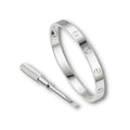 Two silver rings on a white background